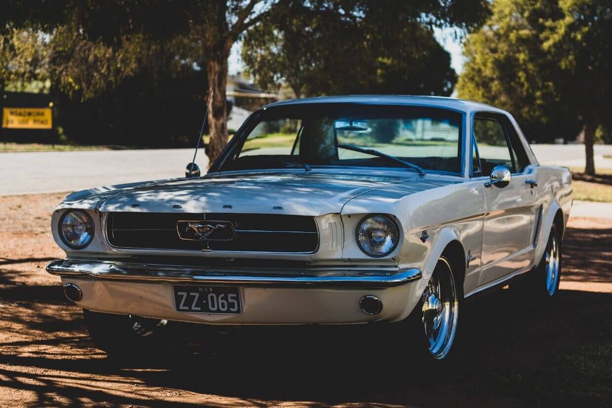 white Ford Mustang coupe